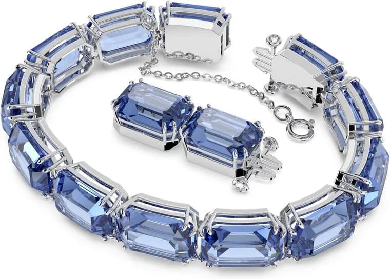 Cadran Swarovski 5614927 affiche un cadran bleu avec index baguette et aiguilles rhodiées, date à 3h