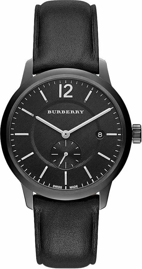 Montre Burberry BU10003 au motif check iconique sur fond noir, aiguilles argentées et style élégant