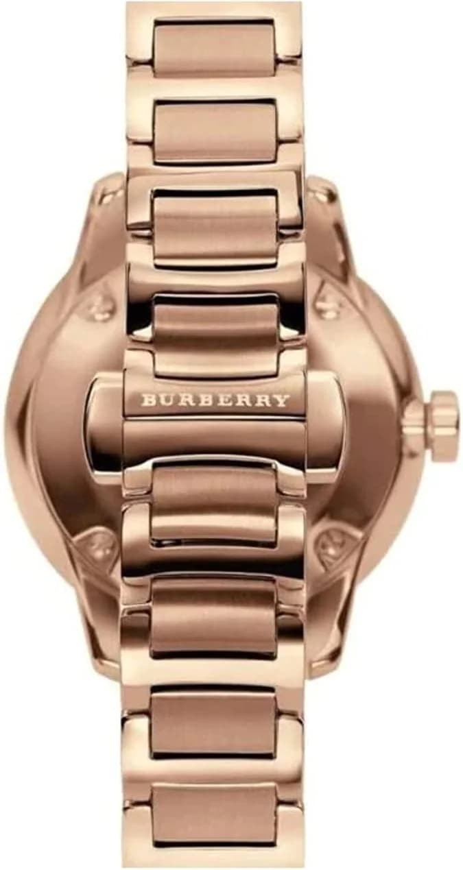 Cadran Burberry BU10116 avec index bâtons dorés, aiguilles dauphine, date à 3h lumineux