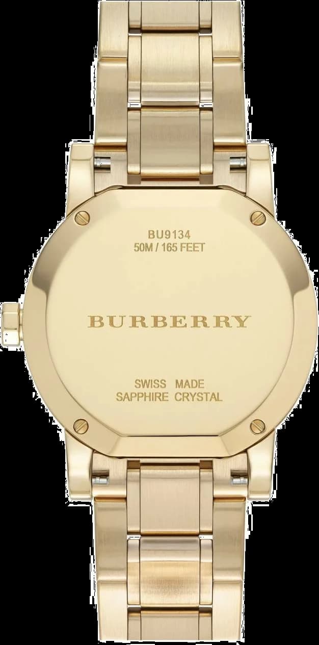 Cadran Burberry BU9134 avec index romains et aiguilles dauphine dorées, date à 3h, style classique chic