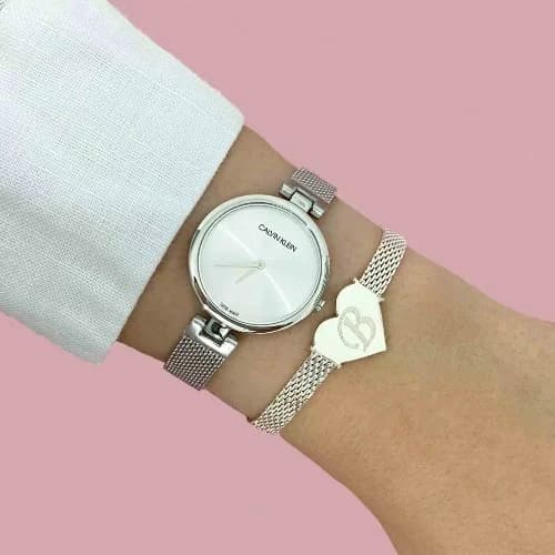 Boîtier Calvin Klein K8G23126 rond en acier inoxydable argenté, lunette fine polie, verre saphir, profil mince et raffiné