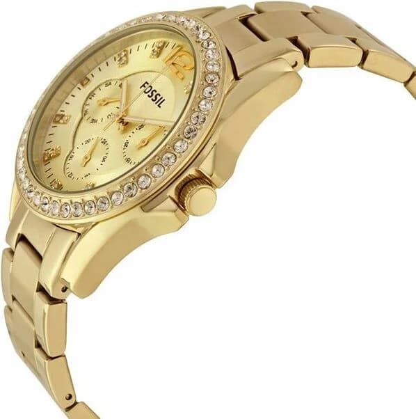 Cadran Fossil ES3203 avec index en chiffres romains et strass, aiguilles dorées et date à 3h, design raffiné