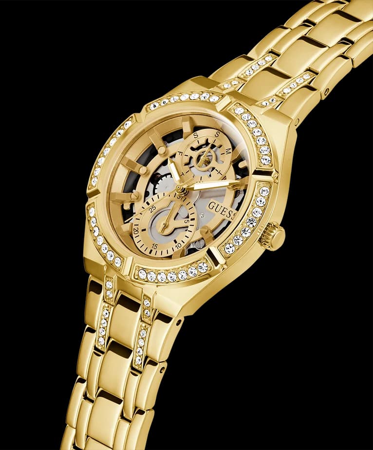 Cadran Guess GW0604L2 affichant des index dorés sur fond ajouré, aiguilles fines et complications multifonctions