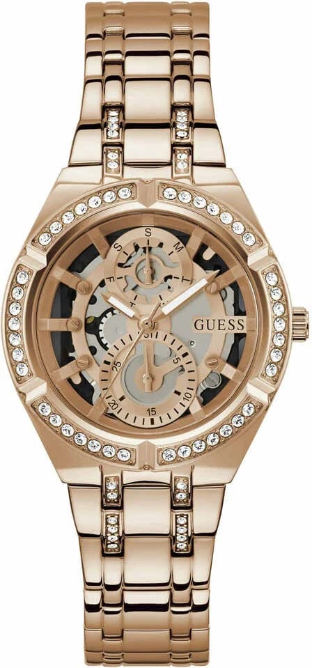 Montre Guess GW0604L3 au cadran squelette dévoilant le mouvement, boîtier rond en acier doré rose et lunette ornée de cristaux scintillants