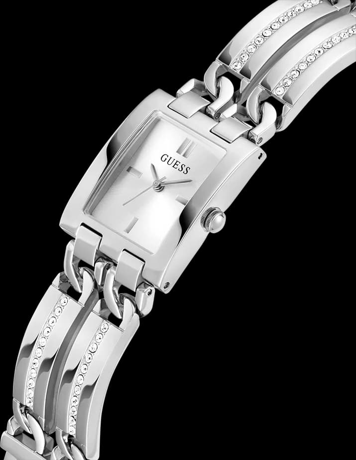 Cadran Guess GW0668L1 blanc nacré avec index dorés, aiguilles argentées, date à 3h et cristaux sur les côtés, raffinement lumineux