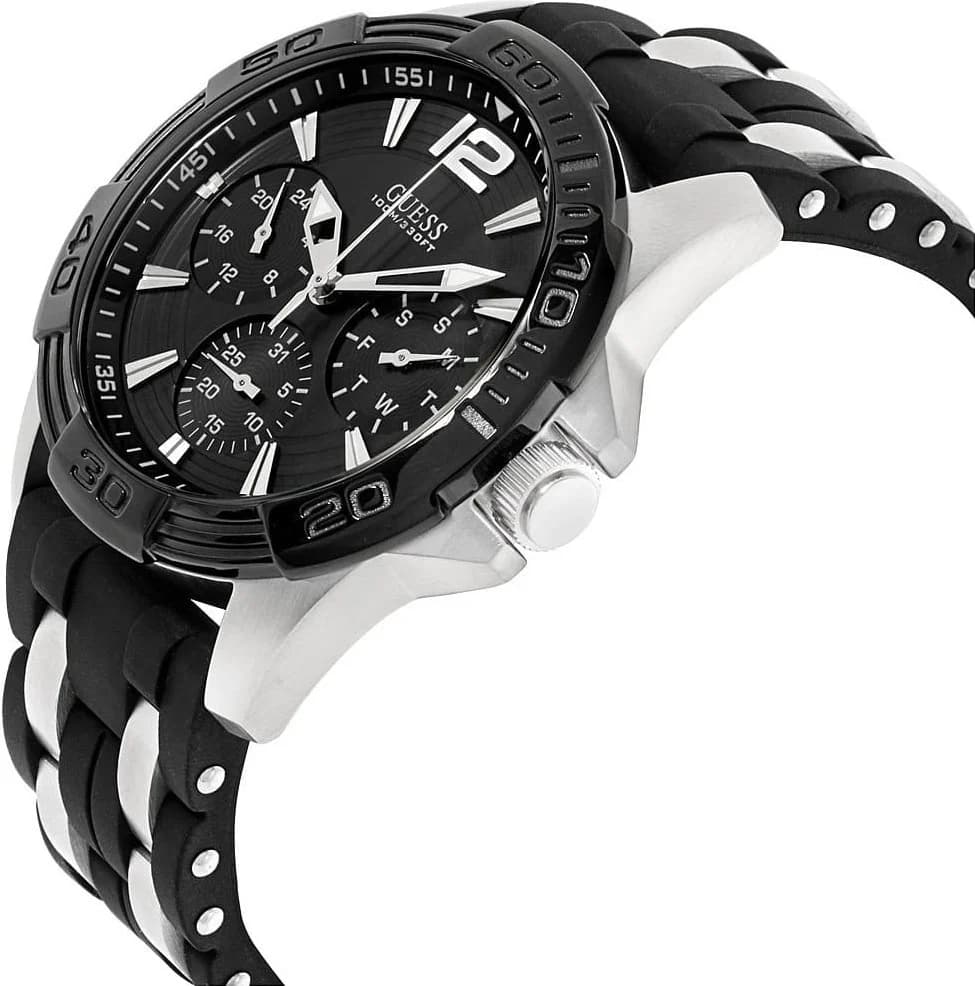 Cadran Guess W0366G1 avec index appliqués dorés, aiguilles luminescentes et guichet date à 3h, design moderne