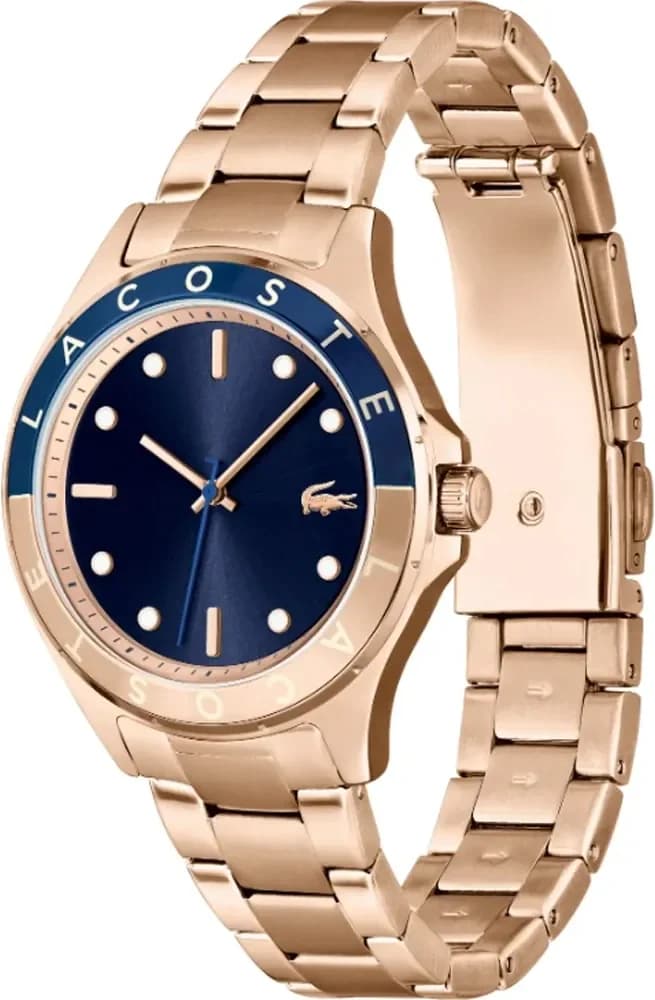 Cadran Lacoste 2001268 bleu avec index bâtons et aiguilles dorées, date à 3h, sobre et raffiné