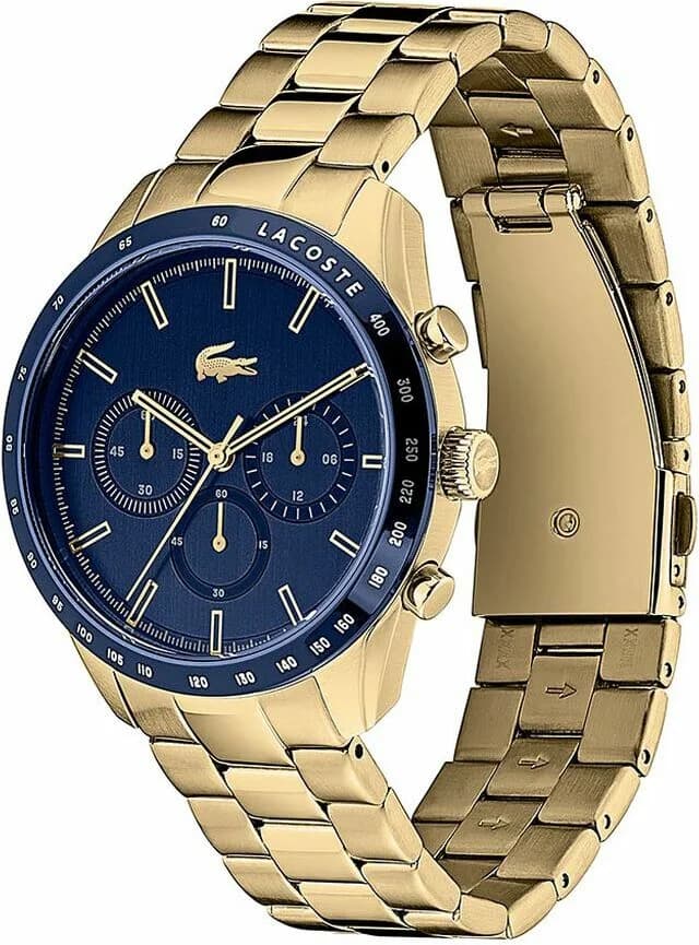 Cadran Lacoste 2011096 avec cadran bleu soleillé, index bâtons dorés et aiguilles dauphine