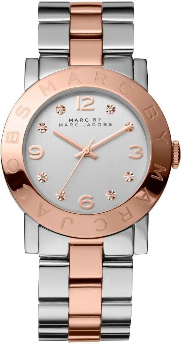 Montre Marc Jacobs MBM3194 avec cadran argenté et index dorés, style chic intemporel