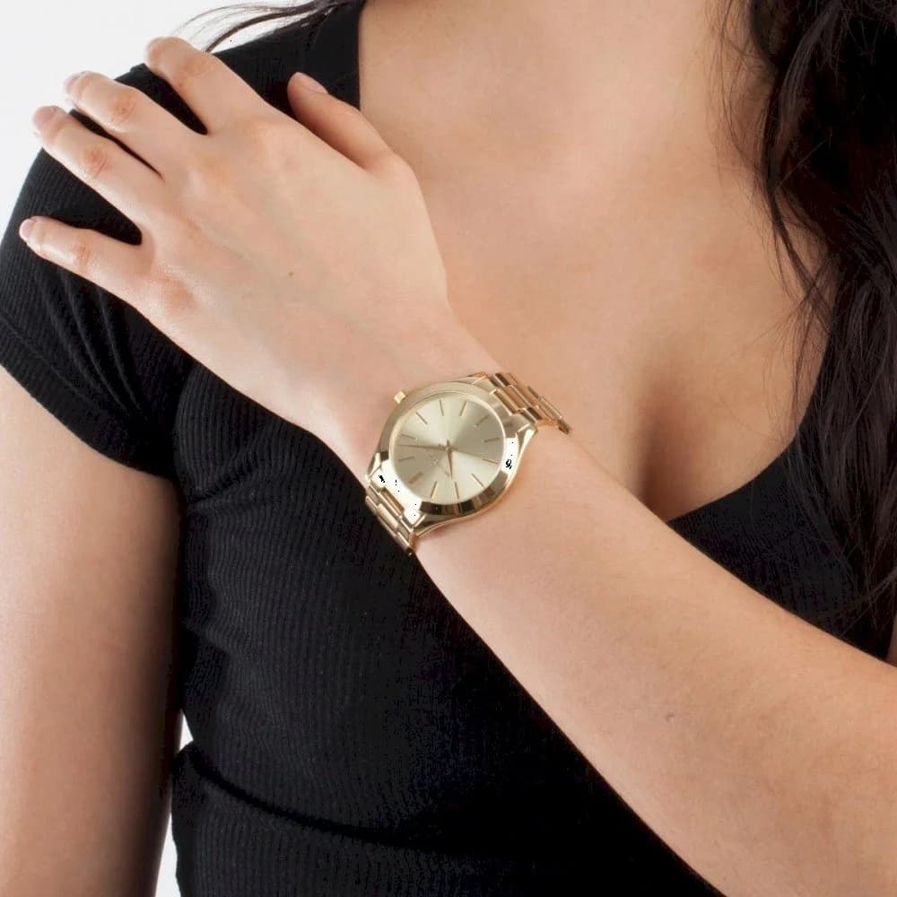 Boîtier Michael Kors MK3179 en acier doré de forme ronde avec lunette lisse et verre saphir