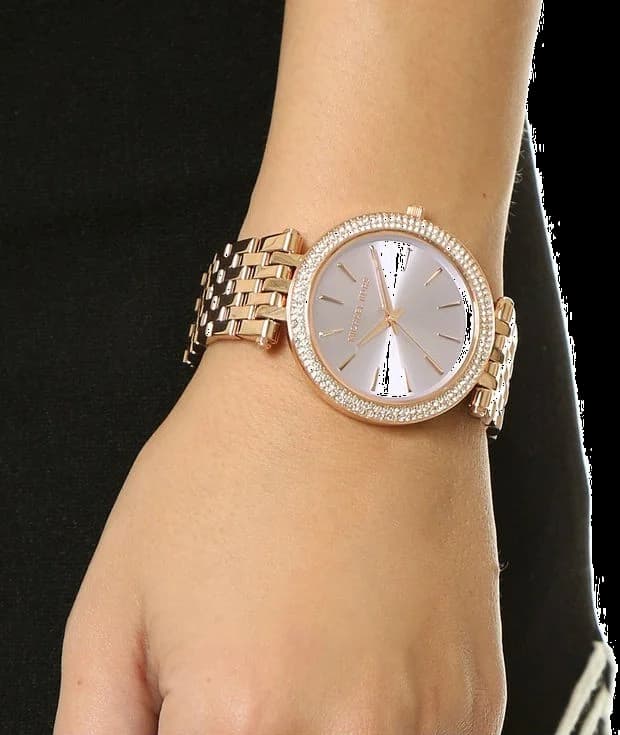 Cadran Michael Kors MK3507 avec index romains dorés, aiguilles dauphine et guichet date à 3h