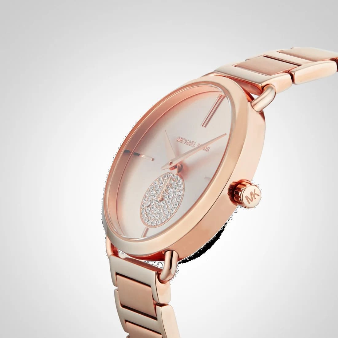 Boîtier Michael Kors MK3640 en acier or rose de forme ronde, lunette lisse et verre minéral, profil fin et raffiné