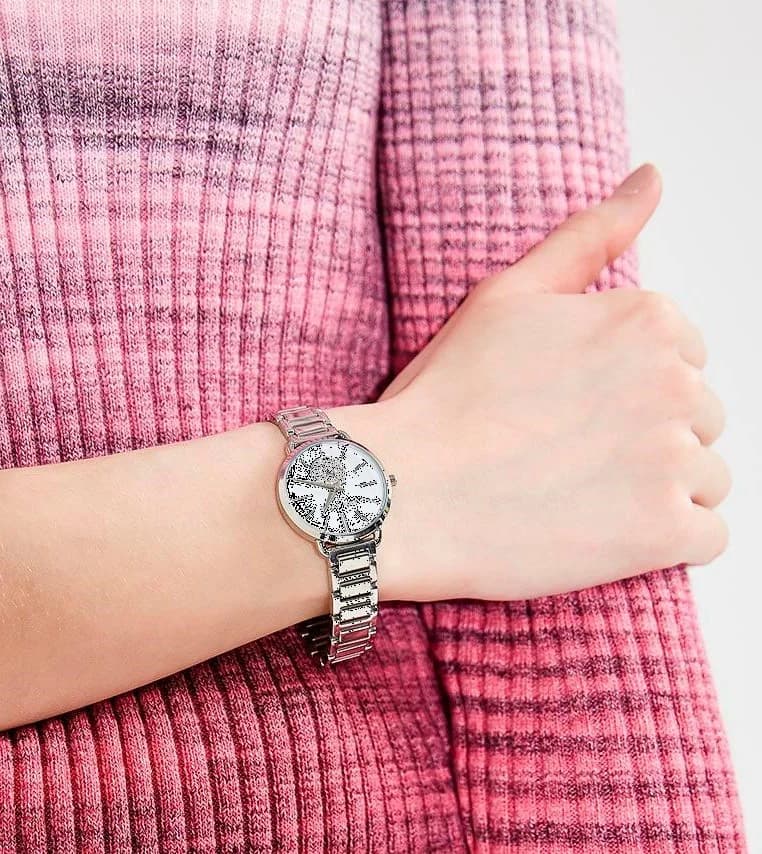 Boîtier Michael Kors MK3837 rond en acier inoxydable poli, lunette lisse, vue profil élégant