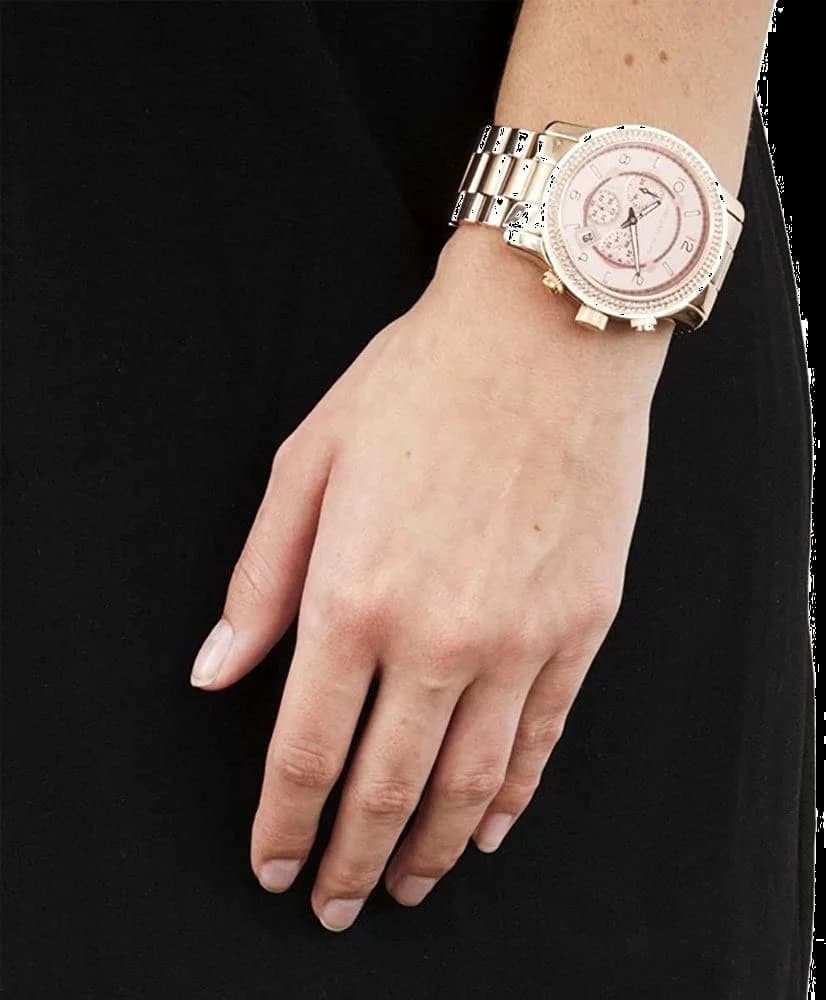 Boîtier Michael Kors MK5576 en acier doré rose, lunette sertie de strass, glace saphir, fond gravé