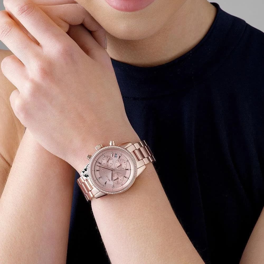 Bracelet Michael Kors MK6357 en acier inoxydable bicolore or rose, maillons lisses, fermoir déployant