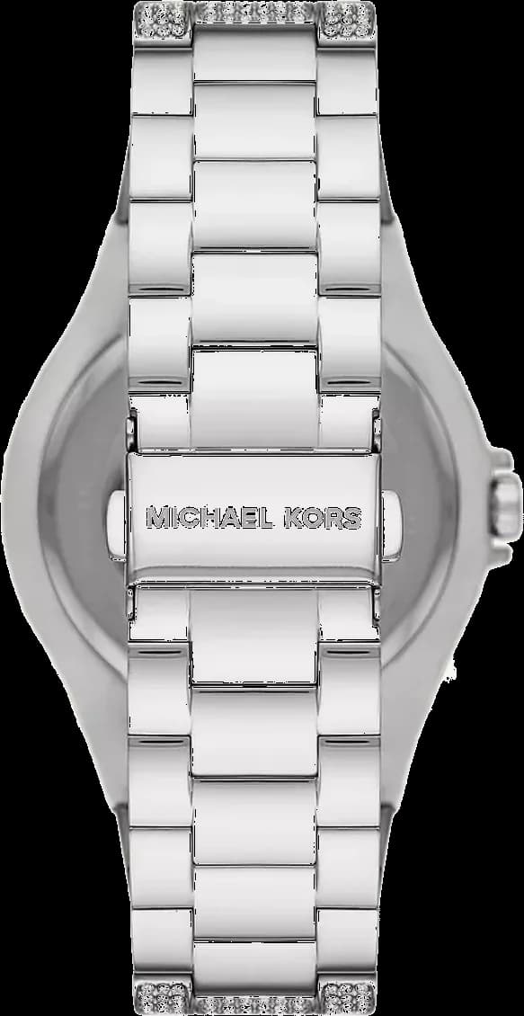 Cadran Michael Kors MK6990 aux index cristaux, aiguilles bleues, date à 3h, pavé scintillant sur lunette