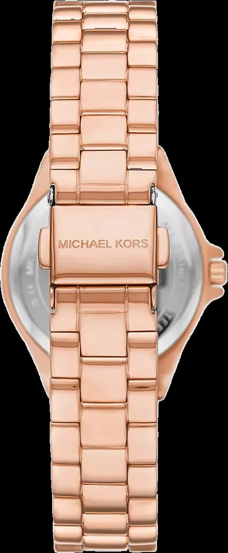 Cadran Michael Kors MK7396 avec index appliqués dorés, aiguilles dauphine et guichet date à 3h, lisibilité élégante
