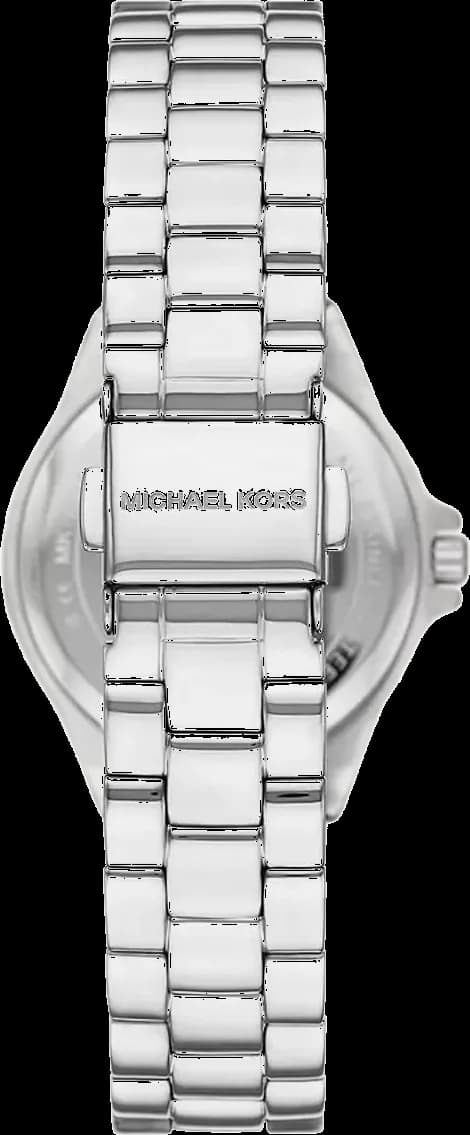 Cadran Michael Kors MK7397 au bleu profond avec index dorés, aiguilles dauphine et date à 3h pour une lisibilité élégante
