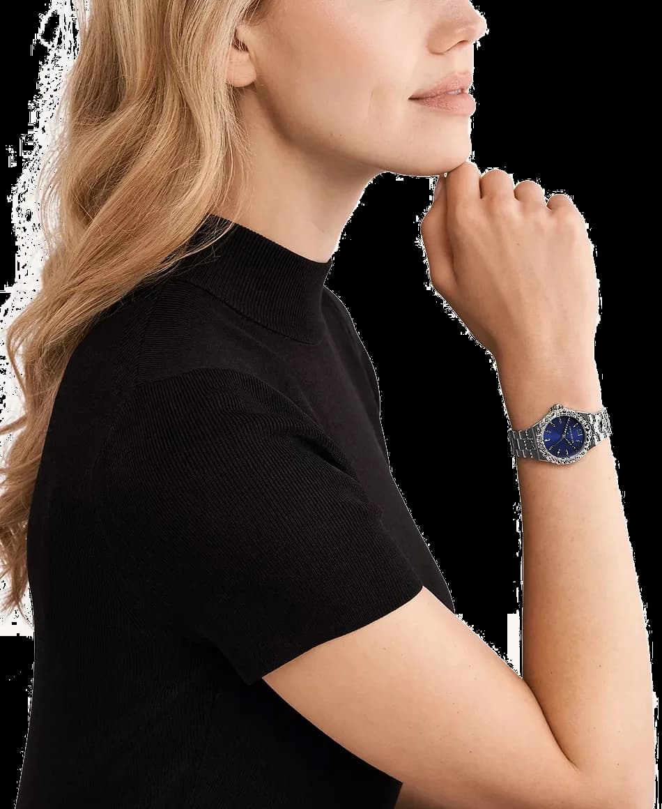 Boîtier Michael Kors MK7397 rond en acier bicolore, lunette lisse et verre minéral, vue de profil fine et raffinée