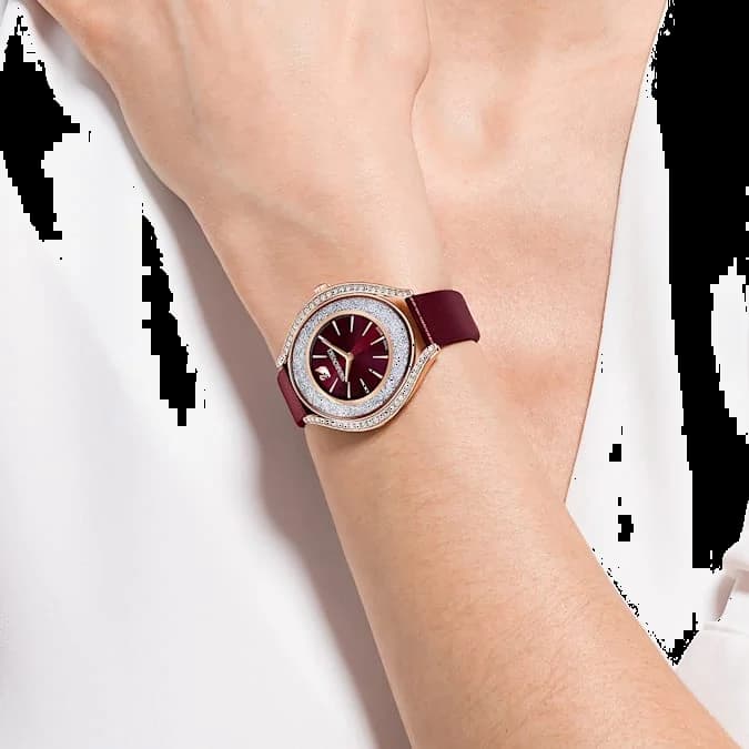 Boîtier Swarovski 5558637 en acier rose gold de forme ronde, lunette lisse, vue profil montre l'élégance classique