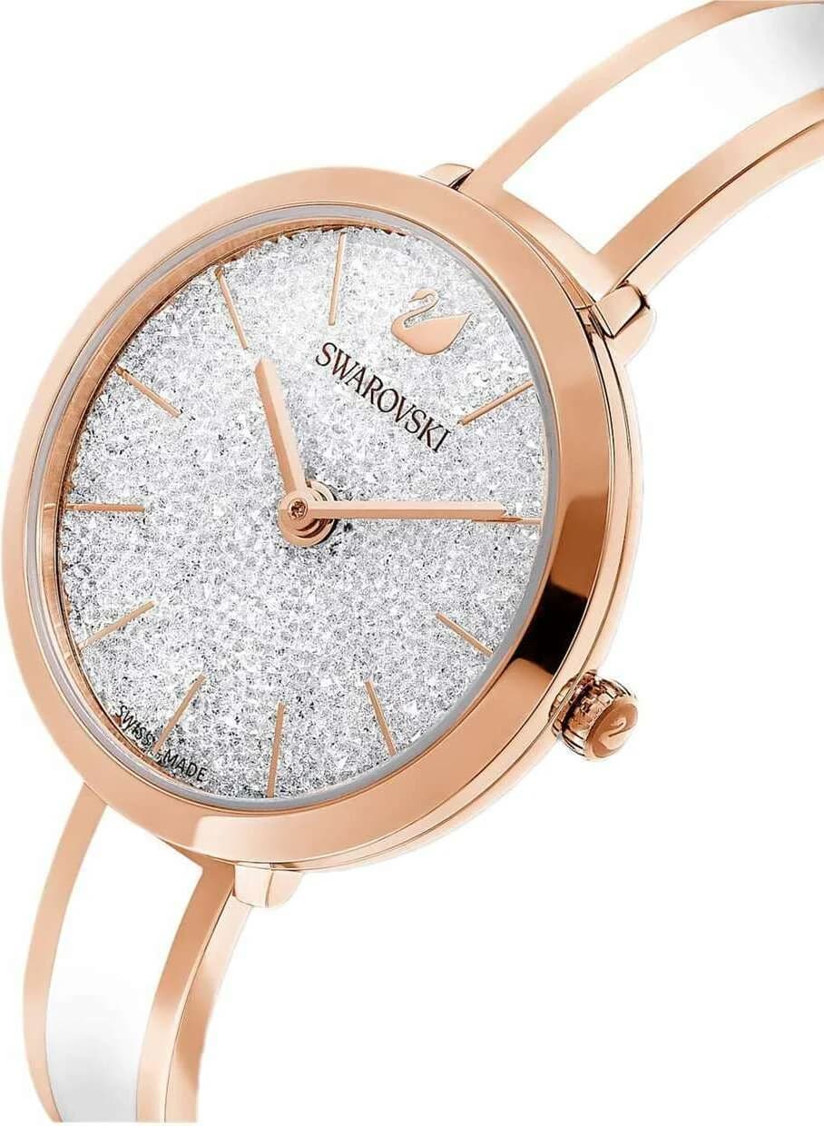 Cadran Swarovski 5580541 au cadran blanc émaillé, index cristal Swarovski et aiguilles dorées