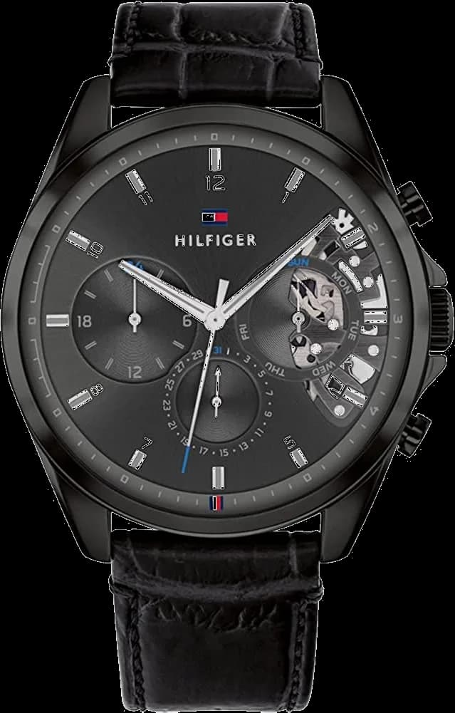 Montre Tommy Hilfiger 1710452 au cadran squelette noir dévoilant le mouvement, acier brossé et bracelet cuir marron pour un style classique moderne