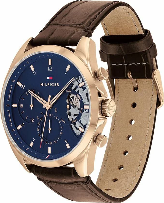 Cadran Tommy Hilfiger 1710453 détail squelette avec index bâtons, aiguilles bleues, guichet date à 3h