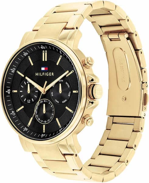 Cadran Tommy Hilfiger 1710589 affiche trois sous-cadrans, index appliqués et aiguilles luminescentes sur fond noir