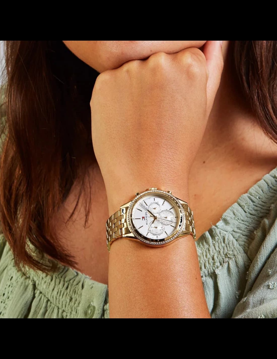 Cadran Tommy Hilfiger 1781977 aux index dorés, aiguilles bâton et date à 3h, cristaux sertis