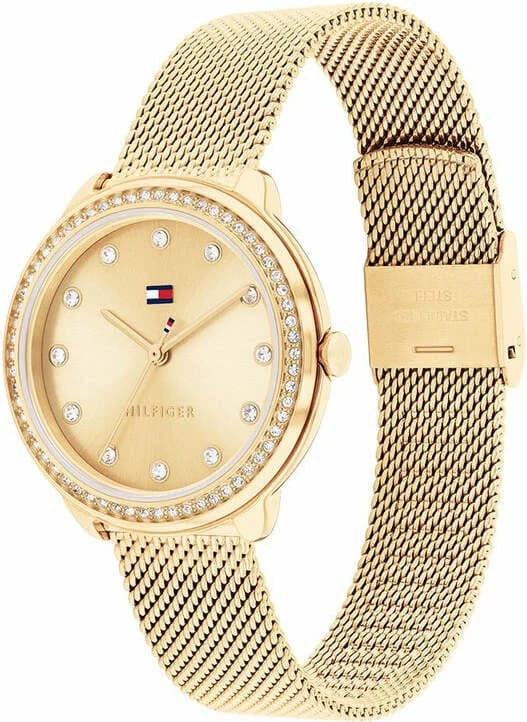 Cadran Tommy Hilfiger 1782699 avec index bâtons dorés et aiguilles fines, date à 3h nacré
